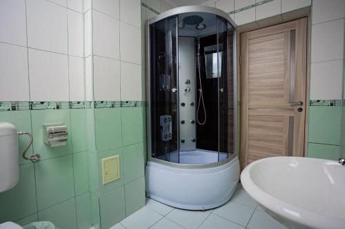 Ванная комната в Pensiunea Valurile Bistritei