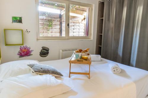 Ένα ή περισσότερα κρεβάτια σε δωμάτιο στο Cocooning Place