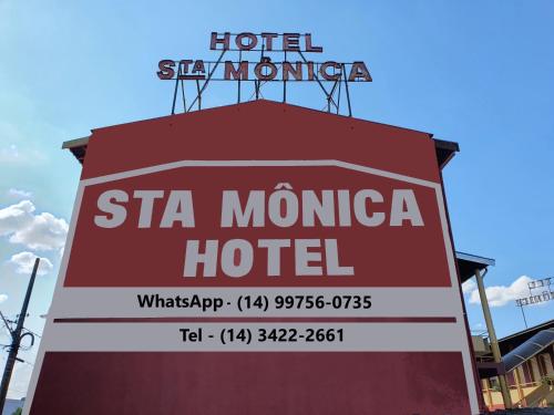 a sign for the hotel sta mora hotel at Hotel Sta Mônica Marília in Marília