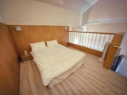 Cama o camas de una habitación en 墾丁椰林 海灘文旅