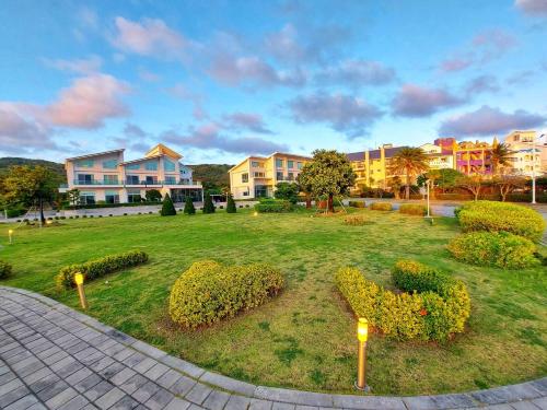 Jardín al aire libre en 墾丁椰林 海灘文旅