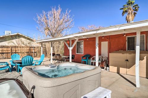 a hot tub on the patio of a house at Cali Desert Oasis with Hot Tub and Mtn Views! in Twentynine Palms