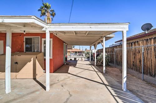 a building with awning on the side of it at Cali Desert Oasis with Hot Tub and Mtn Views! in Twentynine Palms