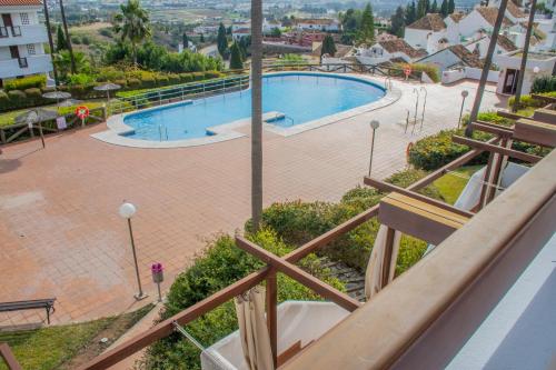 Bazén v ubytovaní Espectacular Apartamento en MIJAS GOLF alebo v jeho blízkosti