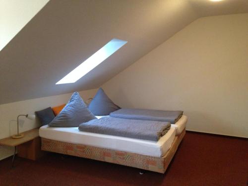 Cama o camas de una habitación en Hotel Astra Rastatt