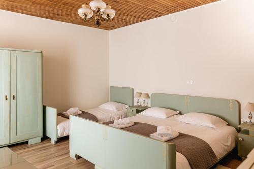 Postel nebo postele na pokoji v ubytování Vila Ana