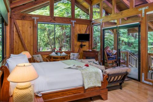 Krevet ili kreveti u jedinici u okviru objekta Volcano Village Lodge