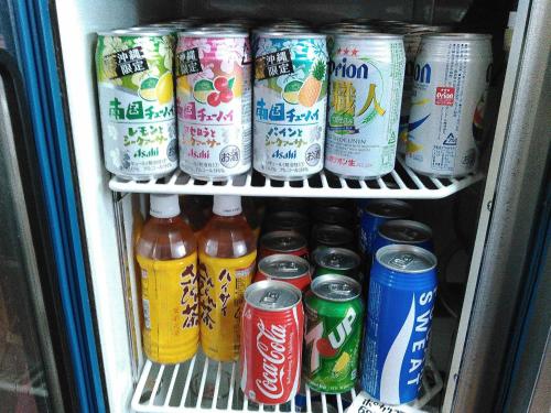 a refrigerator filled with lots of drinks and soda cans at Miyakojima - House - Vacation STAY 22179v in Uechi