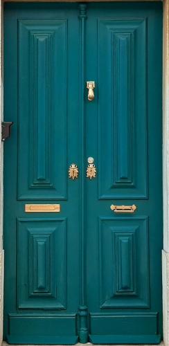 a blue door with gold knockers on it at A Casa do Tenente in Faro