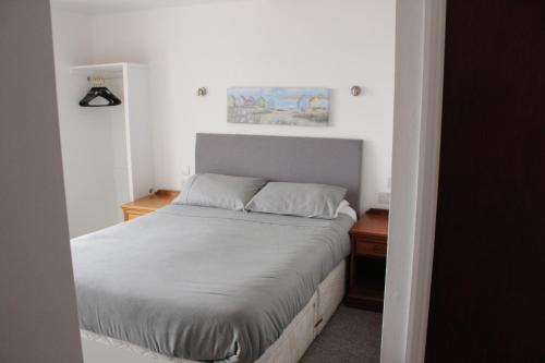 Posteľ alebo postele v izbe v ubytovaní Bayside Holiday Suites