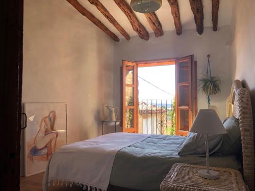 Postel nebo postele na pokoji v ubytování El Cap de Pedra