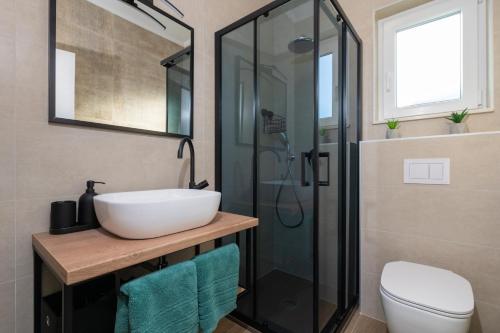 Koupelna v ubytování D&A Superior Apartman