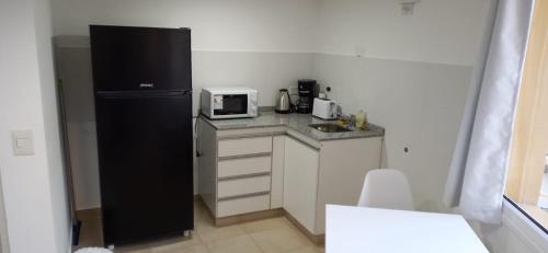 Köök või kööginurk majutusasutuses CAUQUEN BARILOCHE