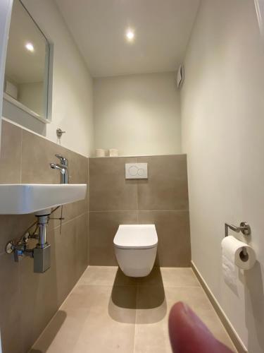 Ένα μπάνιο στο Ferienappartements Bergen