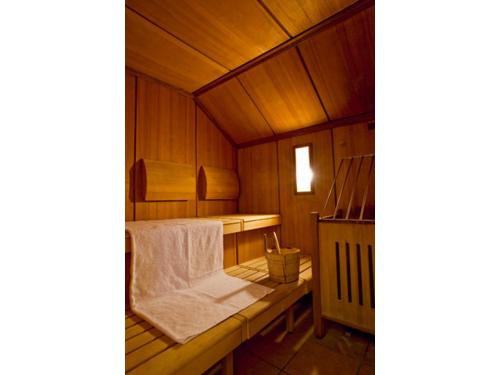 an inside of a sauna with a towel at SORAT Insel-Hotel Regensburg in Regensburg