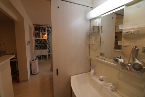 Ett badrum på Hassamu 3 Jo 1-11-1 Corole Kotoni - Vacation STAY 11468