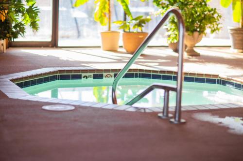 a small swimming pool with a hand rail in it at Inn at the Canyons in Monticello