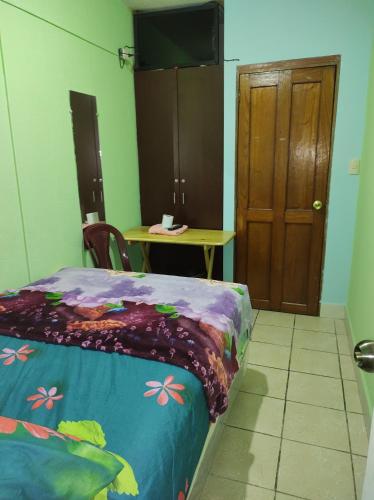 Postel nebo postele na pokoji v ubytování HOTEL EL EDEN