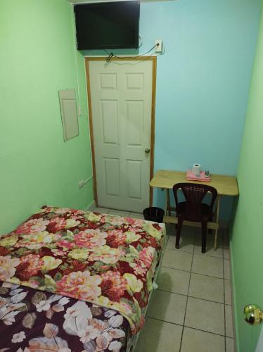 Postel nebo postele na pokoji v ubytování HOTEL EL EDEN