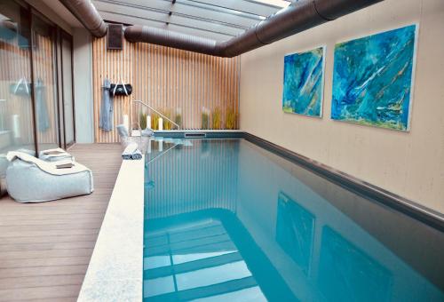 The swimming pool at or close to The Lodge Sporthotel - Golfclub Eppan