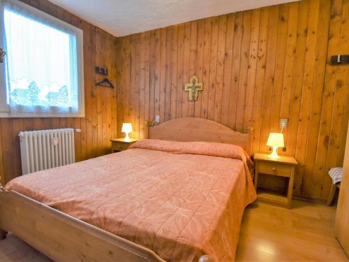 Ένα ή περισσότερα κρεβάτια σε δωμάτιο στο Apartment Fienili di Brenta 21 by Interhome