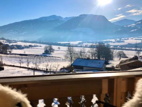 a view of snow covered mountains from a balcony at Apartment Rosalie by Interhome in Hart im Zillertal