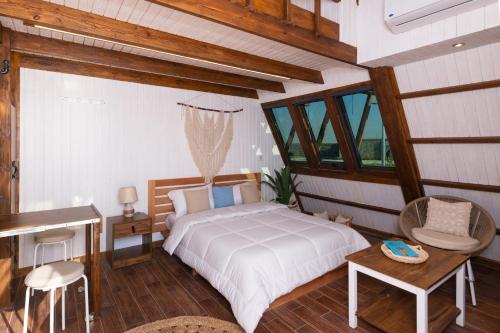 Cama o camas de una habitación en Matarma Beach Residence