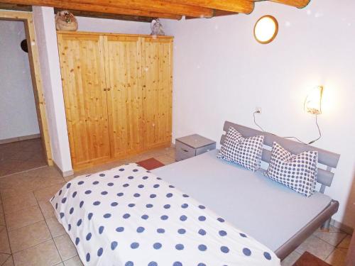 Postel nebo postele na pokoji v ubytování Holiday Home Rustico dell'Orino by Interhome