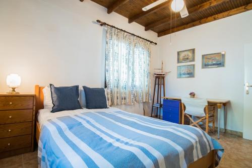 Postel nebo postele na pokoji v ubytování Villa Pefka