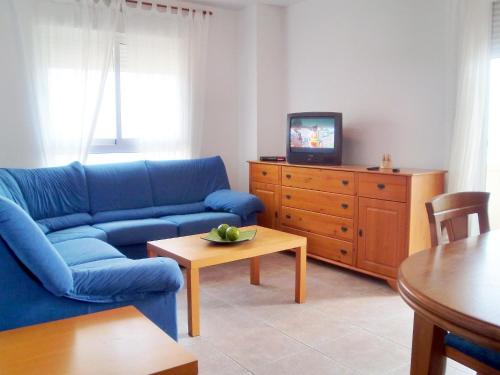 Televízia a/alebo spoločenská miestnosť v ubytovaní Apartment Urbaeuropa by Interhome