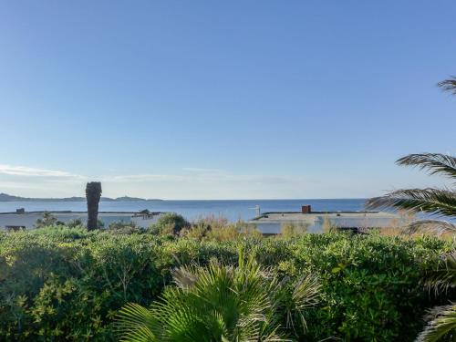 a view of the ocean from a beach at Holiday Home Le Rayolet by Interhome in Le Brusc