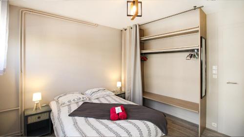 Gulta vai gultas numurā naktsmītnē HOMEY COZY - New / Centre / Balcon privé / Proche Geneve