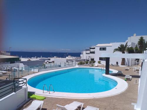 Apartment Portonovo La Paloma Amazing sea view & swimming pool-good wifi -free AC- private parking