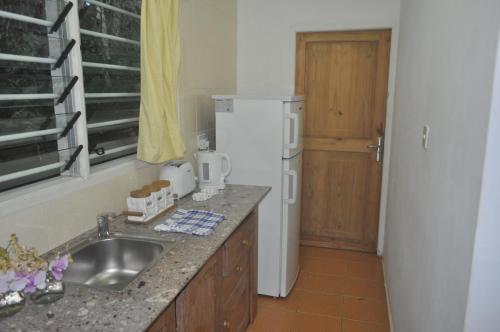 Una cocina o cocineta en Kokogrove Chalets