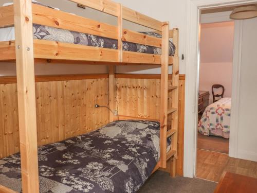 a bunk bed room with two bunk beds at The Rest in Eyemouth