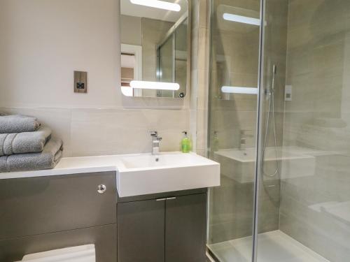 a bathroom with a sink and a shower at Little Acres in Selby