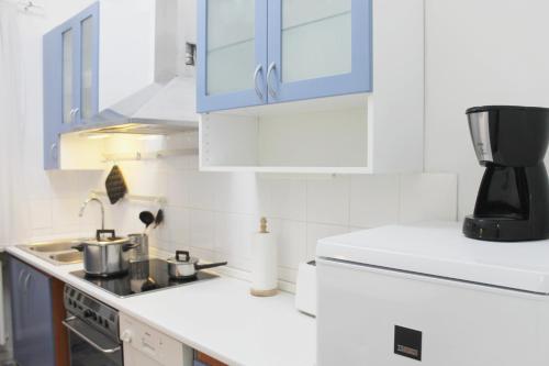 Kuchyňa alebo kuchynka v ubytovaní Modern apartment Michalska 6