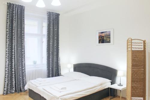 Postel nebo postele na pokoji v ubytování Modern apartment Michalska 6