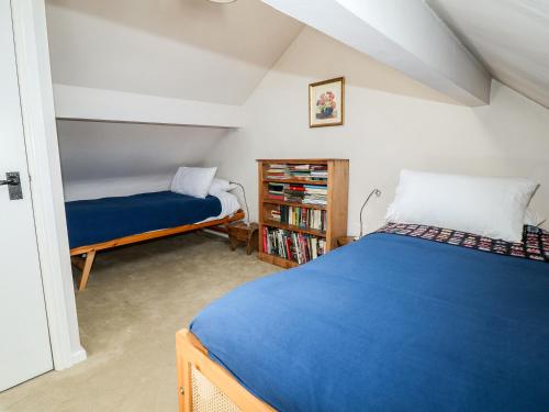 Cama ou camas em um quarto em Ivy Cottage