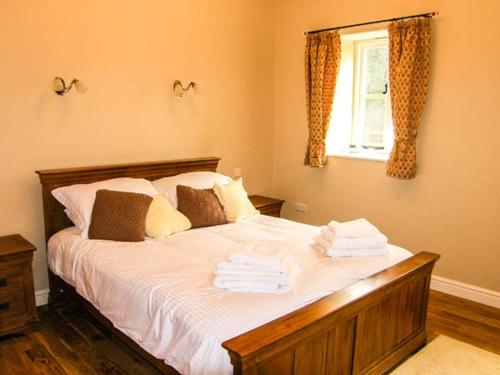 En eller flere senge i et værelse på The Lambing Shed