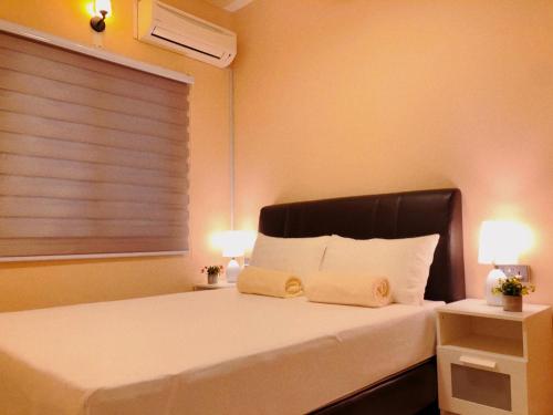 Katil atau katil-katil dalam bilik di 101 Sky Mirror Homestay