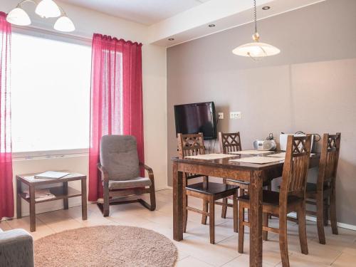 TV a/nebo společenská místnost v ubytování Holiday Home Yllästar 3 as 508 by Interhome