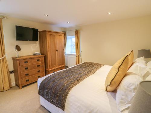 Posteľ alebo postele v izbe v ubytovaní Fogga Croft Cottage