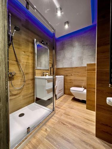 A bathroom at Apartamenty na 1 Maja