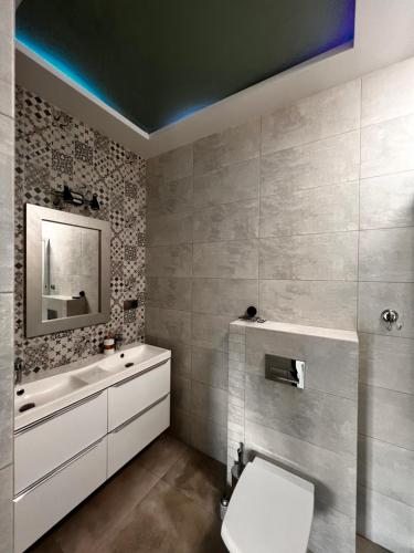 Ванная комната в Apartamenty na Maja -4-