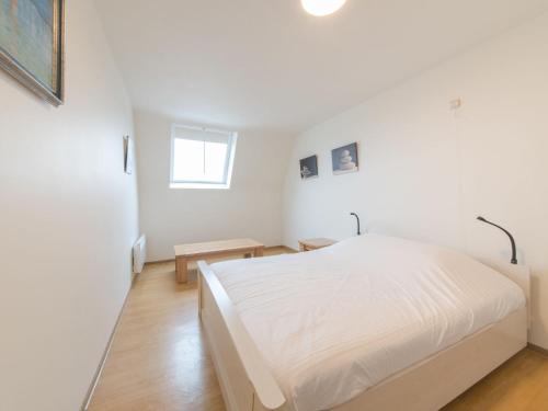 Katil atau katil-katil dalam bilik di Apartment Duplex by Interhome
