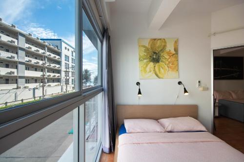 Avatara B condominium B23にあるベッド