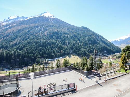a skate park in front of a mountain at Holiday Home Hölzl by Interhome in Flirsch