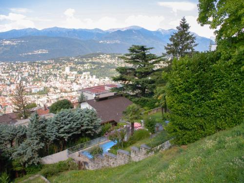 a view of a city from a hill at Holiday Home Nido di Rondine-1 by Interhome in Lugano