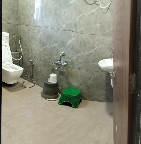 Un baño de Hotel Mansarovar,Vadodara